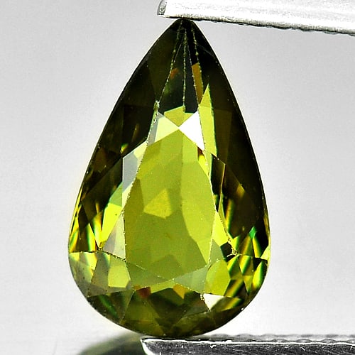 Natural Green Demantoid Garnet 2.45 Ct. Pear Shape 11 x 7 Mm. Gemstone Unheated From Madagascar: Product ID: 802922082 Product Name: Natural Demantoid Weight: 2.45 CT. Size: 11 x 7 x 4 MM. Shape: Pear Color: Green Clarity:VSI Luster: Very Good Gems Origin: Mardagascar Treatment: Unheated Crystal 
