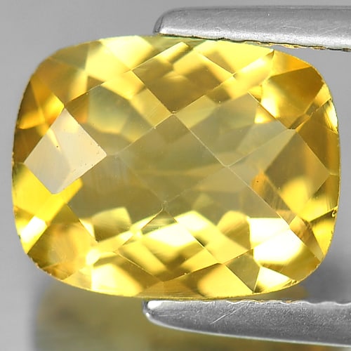 Natural Yellow Citrine 2.43 Ct. Cushion Checkerboard Cut 10.2 x 8.2 Mm. Unheated Gemstone: Product ID: 801812895 Product Name: Natural Citrine Weight: 2.43 CT. Size: 10.2 x 8.2 x 5.2 MM. Shape: Cushion Checkerboard Color: Yellow Clarity:VSI Luster: Good Gems Origin: Brazil Treatment: Unheat