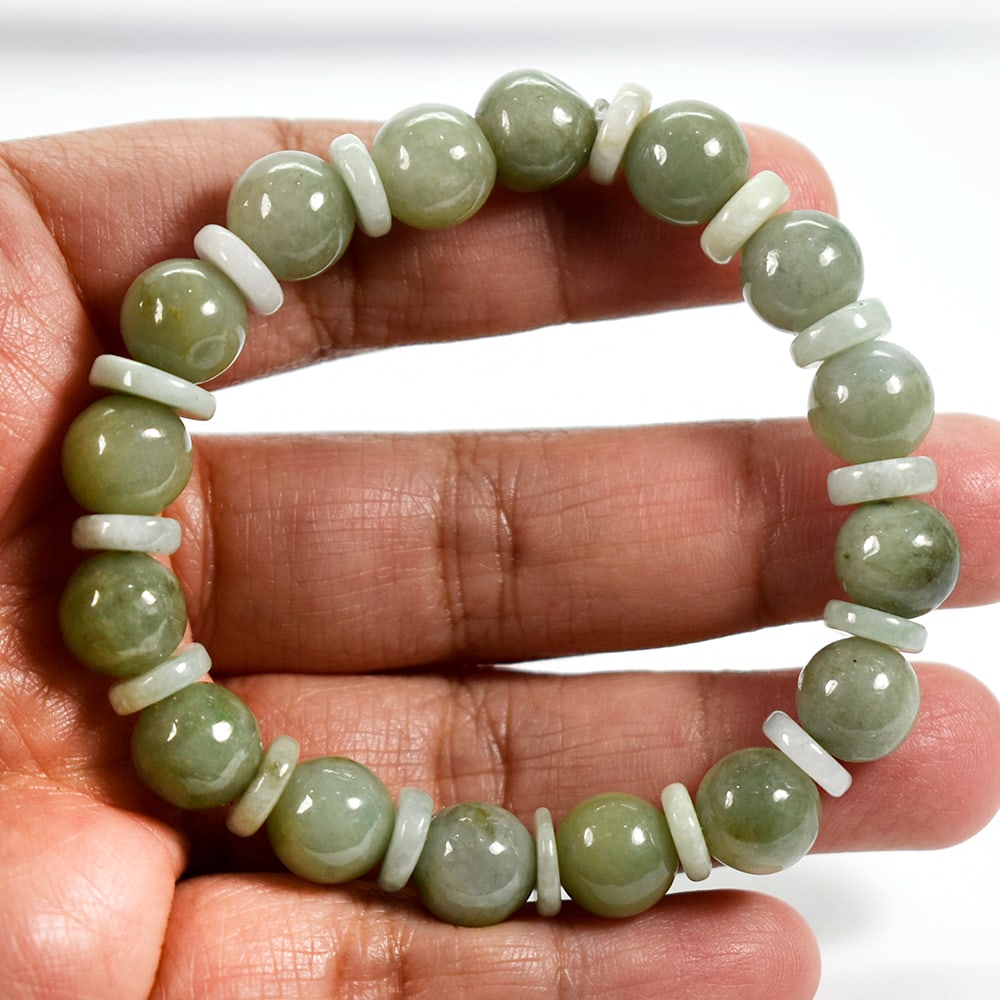 Natural Burmese Green Jade 150.68 Ct. Beads Flexibility Bracelet Length 7 Inch.: Product ID: 818102440 Product Name: Natural Gemstones Weight: 150.68 CT. Size: 7 Inch MM. Shape: Round Cabochon Color: Green Clarity:Opaque Luster: Good Gems Origin: Burma Treatment: Unheated Crystal