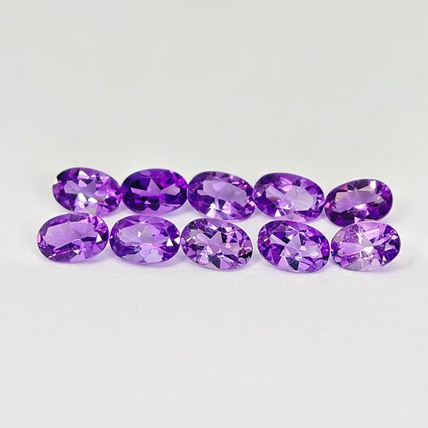 Natural Purple Amethyst 4.11 Ct. 10 Pcs. Oval Shape 6.1 x 4 Mm. Gemstones From Brazil: Product ID: 800325268 Product Name: Natural Amethyst Weight: 4.11 CT. Size: 6 x 4.1 x 3 MM. Shape: Oval Color: Purple Clarity:VVS Luster: Good Gems Origin: Brazil Treatment: Unheated Crystal Structure