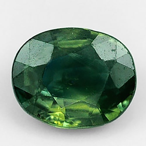 Natural Green Sapphire 0.82 Ct. Oval Shape 6.4 x 5.2 Mm. Gemstone From Thailand: Product ID: 106118003 Product Name: Natural Green Sapphire Weight: 0.82 CT. Size: 6.4 x 5.2 x 2.7 MM. Shape: Oval Color: Party Color Clarity:VSI Luster: Good Gems Origin: Thailand Treatment: Heated Cr
