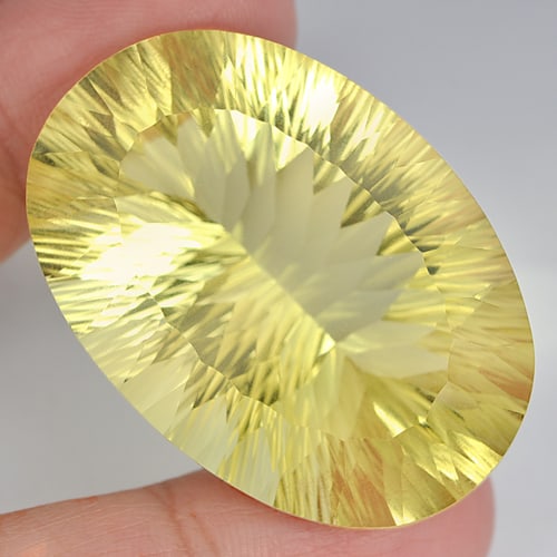 Natural Yellow Lemon Quartz 100.67 Ct. Clean Oval Concave Cut 40 x 27 Mm. Gemstone From Brazil: Product ID: 805526342 Product Name: Natural Quartz Weight: 100.67 CT. Size: 40 x 27 x 6.5 MM. Shape: Oval Concave Cut Color: Yellow Clarity:IF Luster: Good Gems Origin: Brazil Treatment: Unheated Crys