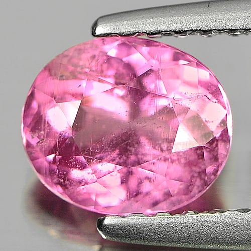 Natural Pink Tourmaline 0.96 Ct. Oval Shape 6.7 x 5.7 Mm Gemstone From Nigeria: Product ID: 807232392 Product Name: Natural Tourmaline Weight: 0.96 CT. Size: 6.7 x 5.7 x 3.9 MM. Shape: Oval Color: Pink Clarity:SI Luster: Good Gems Origin: Nigeria Treatment: Unheated Crystal Struc