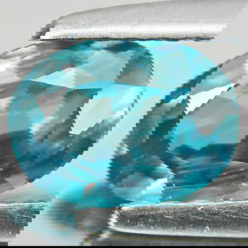 Natural Blue Zircon 1.01 Ct. VVS Oval Shape 7 x 5.1 Mm. Gemstone From Cambodia: Product ID: 807721526 Product Name: Natural Zircon Weight: 1.01 CT. Size: 7 x 5.1 x 2.8 MM. Shape: Oval Color: Blue Clarity:VVS Luster: Good Gems Origin: Cambodia Treatment: Heated Crystal Structure: