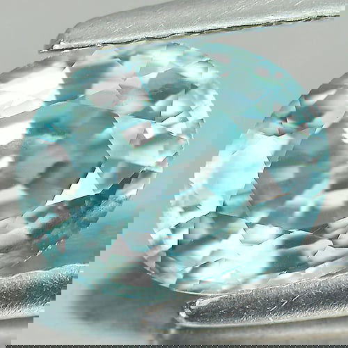 Natural Blue Zircon 2.07 Ct. Oval Shape 8 x 6.6 Mm Gemstone From Cambodia: Product ID: 807720665 Product Name: Natural Zircon Weight: 2.07 CT. Size: 8 x 6.6 x 4 MM. Shape: Oval Color: Blue Clarity:VSI Luster: Good Gems Origin: Cambodia Treatment: Heated Crystal Structure: Te