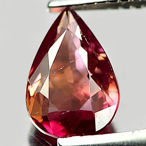 Natural Orangish Pink Tourmaline 0.63 Ct. Pear Shape 7.2 x 4.5 Mm Gemstone From Nigeria: Product ID: 807248128 Product Name: Natural Tourmaline Weight: 0.63 CT. Size: 7.2 x 4.5 x 2.8 MM. Shape: Pear Color: Orangish Pink Clarity:VSI Luster: Good Gems Origin: Nigeria Treatment: Unheated Cry