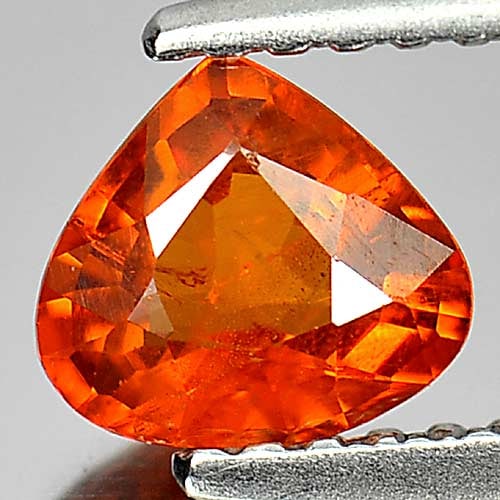 Natural Orange Spessartine Garnet 0.76 Ct. Pear Shape 6.1 x 5.6 Mm. Gemstone From Namibia: Product ID: 802934629 Product Name: Natural Spessartine Weight: 0.76 CT. Size: 6.1 x 5.6 x 2.8 MM. Shape: Pear Color: Orange Clarity:VSI Luster: Good Gems Origin: Namibia Treatment: Unheated Crystal S