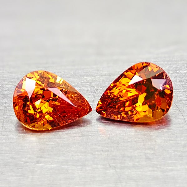 Natural Orangish Red Spessartine Garnet 1.66 Ct. 2 Pcs Pear Shape 6.7 x 5 Mm Gemstone From Nigeria: Product ID: 802936409 Product Name: Natural Spessartine Weight: 1.66 CT. Size: 6.7 x 5 x 4 MM. Shape: Pear Shape Color: Orangish Red Clarity:VSI Luster: Good Gems Origin: Nigeria Treatment: Unheated C
