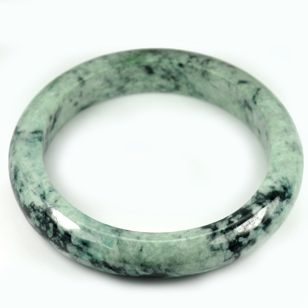 Natural Green Jade Bangle Size 88 x 67 x 14 Mm. Gemstone Unheated 454.87 Ct.: Product ID: 819814822 Product Name: Natural Jade Weight: 454.87 CT. Size: 88 x 67 x 14 MM. Shape: Round Color: Green Clarity:Opaque Luster: Good Gems Origin: Thailand Treatment: Unheated Crystal Struc