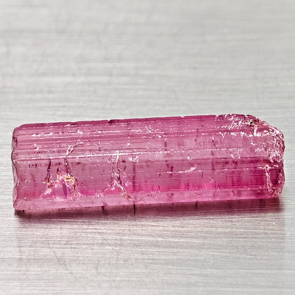 Natural Pink Tourmaline 6.64 Ct Rough Size 19.8 x 6.1 Mm Gemstone From Brazil: Product ID: 597200001 Product Name: Natural Tourmaline Weight: 6.64 CT. Size: 19.8 x 6.1 x 5.4 MM. Shape: Rough Mixed Shape Color: Pink Clarity:None Luster: Good Gems Origin: Brazil Treatment: Unheate