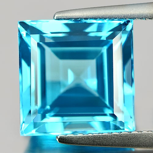 Natural Swiss Blue Topaz 6.70 Ct. Square Shape 9.8 Mm Gemstone From Brazil: Product ID: 807165948 Product Name: Natural Blue Topaz Weight: 6.70 CT. Size: 9.8 x 9.8 x 6.7 MM. Shape: Square Color: Blue Clarity:VSI Luster: Good Gems Origin: Brazil Treatment: Treated Crystal Stru