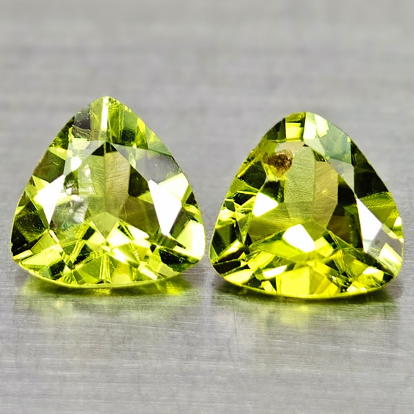 Natural Green Peridot 1.36 Ct. 2 Pcs. Trilliant Shape 5.9 Mm Gemstones From Pakistan: Product ID: 805317032 Product Name: Natural Peridot Weight: 1.36 CT. Size: 5.9 x 5.9 x 2.9 MM. Shape: Trilliant Color: Green Clarity:VSI Luster: Good Gems Origin: Pakistan Treatment: Unheated Crystal 
