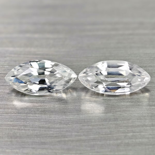 Natural White Zircon 1.76 Ct. 2 Pcs. Marquise Shape 8.1 x 4 Mm Gemstones From Cambodia: Product ID: 807742936 Product Name: Natural Zircon Weight: 1.76 CT. Size: 8.1 x 4 x 3 MM. Shape: Marquise Color: White Clarity:VSI Luster: Good Gems Origin: Cambodia Treatment: Heated Crystal Structur