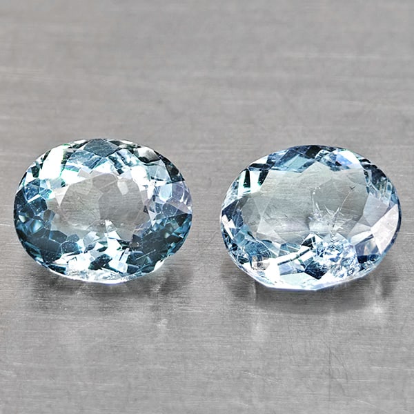 Natural Light Blue Aquamarine 1.71 Ct. 2 Pcs Oval Shape 7.2 x 6.3 Mm Gemstones From Brazil: Product ID: 800812019 Product Name: Natural Aquamarine Weight: 1.71 CT. Size: 7.2 x 6.3 x 3.1 MM. Shape: Oval Color: Light Blue Clarity:VSI Luster: Good Gems Origin: Brazil Treatment: Unheated Crystal