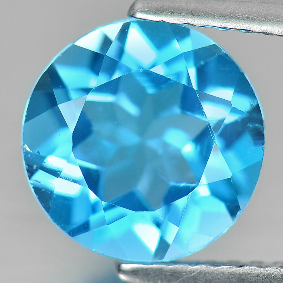 Natural Swiss Blue Topaz 2.97 Ct. Round Shape Size 8.9 Mm. Gemstone Brazil: Product ID: 807155909 Product Name: Natural Blue Topaz Weight: 2.97 CT. Size: 8.9 x 8.9 x 5.2 MM. Shape: Round Color: Blue Clarity:VSI Luster: Good Gems Origin: Brazil Treatment: Treated Crystal Struc