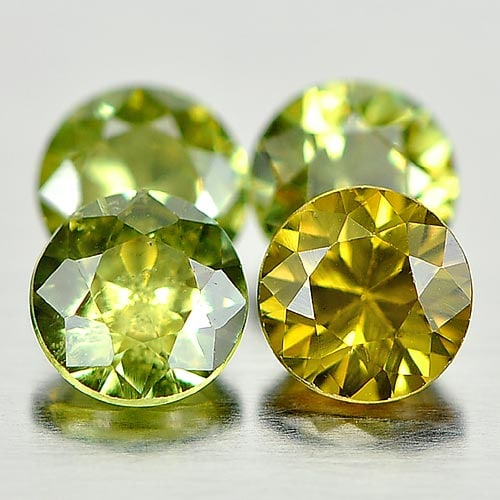 Natural Yellowish Green Demantoid Garnet 1.48 Ct. 4 Pcs. Round Diamond Cut 4.3 Mm. Gemstone From: Product ID: 802931641 Product Name: Natural Demantoid Weight: 1.48 CT. Size: 4.3 x 4.3 x 3 MM. Shape: Round Diamond Cut Color: Yellowish Green Clarity:VVS - VSI Luster: Very Good Gems Origin: Madagasc