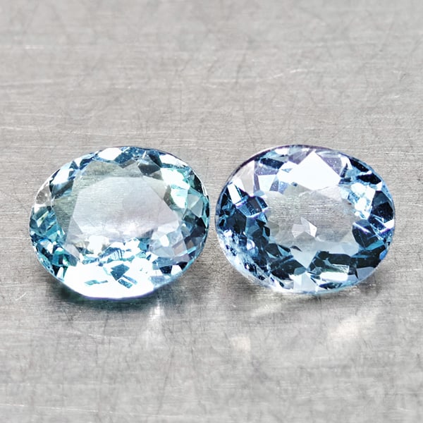 Natural Light Blue Aquamarine 1.15 Ct. 2 Pcs Oval Shape 5.9 x 5.3 Mm Gemstones From Brazil: Product ID: 800812027 Product Name: Natural Aquamarine Weight: 1.15 CT. Size: 5.9 x 5.3 x 2.9 MM. Shape: Oval Color: Light Blue Clarity:VSI Luster: Good Gems Origin: Brazil Treatment: Unheated Crystal