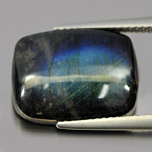 Natural Multi Color Blue Labradorite Doublet 9.60 Ct. Baguette Cabochon Shape 15.9 x 11.9 Mm.: Product ID: 804301194 Product Name: Natural Labradorite Weight: 9.60 CT. Size: 15.9 x 11.9 x 5.1 MM. Shape: Baguette Cabochon Color: Multi-Color Clarity:Opaque Luster: Iridescent Gems Origin: Canada T