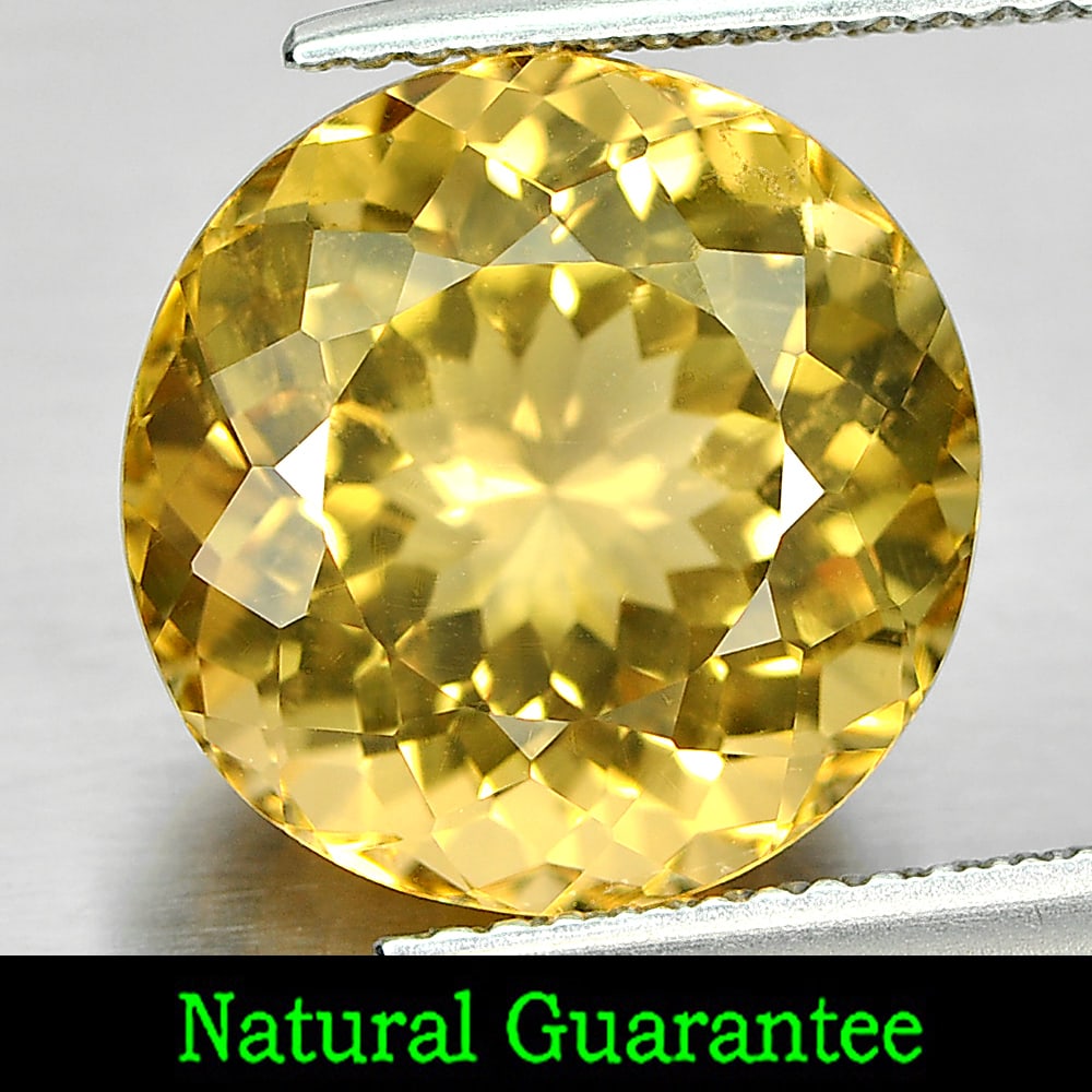 Natural Yellow Citrine 7.43 Ct. Round Shape 12.7 Mm. Gemstone From Brazil: Product ID: 801813264 Product Name: Natural Citrine Weight: 7.43 CT. Size: 12.7 x 12.7 x 8.7 MM. Shape: Round Color: Yellow Clarity:VSI Luster: Good Gems Origin: Brazil Treatment: Unheated Crystal Str