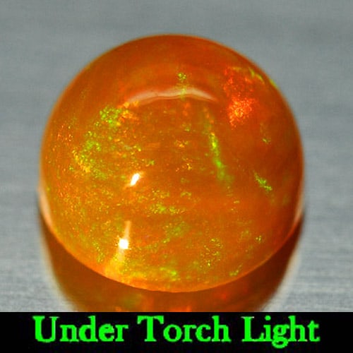 Natural Multi Color Play Of Colour Opal 1.20 Ct. Round Cabochon Shape 7 Mm Gemstone From Ethiopia: Product ID: 818725239 Product Name: Natural Opal Weight: 1.20 CT. Size: 7 x 7 x 5 MM. Shape: Round Cabochon Color: Multi Color Clarity:Semi - Transparent Luster: Iridescent Gems Origin: Ethiopia Treat