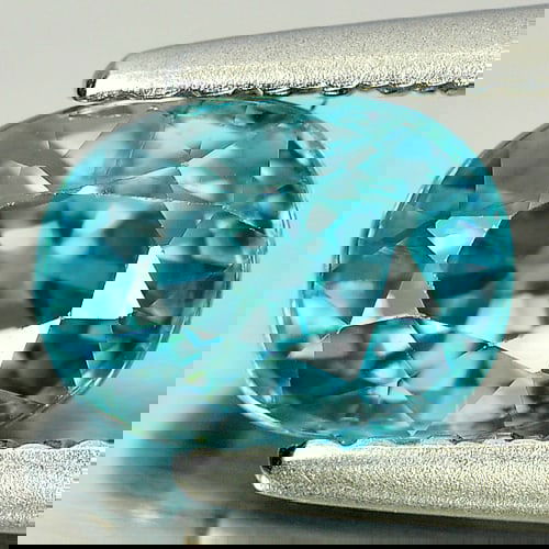 Natural Blue Zircon 1.56 Ct. Oval Shape 6.9 x 5.2 Mm Gemstone From Cambodia: Product ID: 807727054 Product Name: Natural Zircon Weight: 1.56 CT. Size: 6.9 x 5.2 x 4.3 MM. Shape: Oval Color: Blue Clarity:VSI Luster: Good Gems Origin: Cambodia Treatment: Treated Crystal Structur