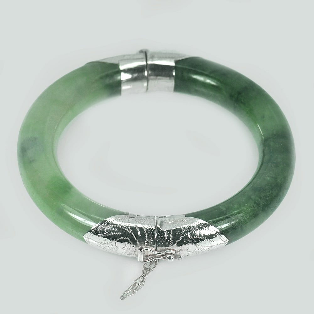 Natural Green Jade Bangle with Silver Jewelry Diameter 58 Mm. 400.04 Ct.: Product ID: 819809061 / Product Name: Natural Jade / Weight: 400.04 CT. / Size: 80 / 58 / 12 MM. / Shape: Round / Color: Green / Clarity:Opaque / Luster: Good / Gems Origin: Thailand / Treatment: Unhe