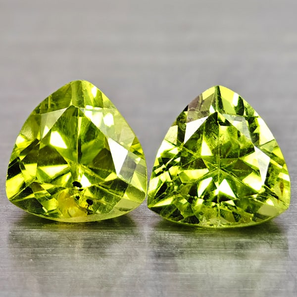 Natural Green Peridot 2.05 Ct. 2 Pcs. Trilliant Shape 6.1 Mm Gemstones From Pakistan: Product ID: 805317067 Product Name: Natural Peridot Weight: 2.05 CT. Size: 6.1 x 6.1 x 4.4 MM. Shape: Trilliant Color: Green Clarity:VSI Luster: Good Gems Origin: Pakistan Treatment: Unheated Crystal 