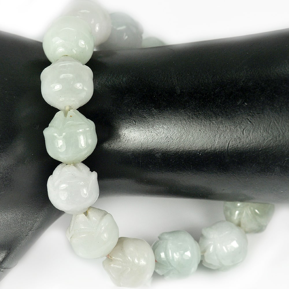 Natural Green Jade 304.24 Ct. Beads Flexibility Bracelet Carving 8 Inch.: Product ID: 819814170 Product Name: Natural Jade Weight: 304.24 CT. Size: Length 8 Inch.12 x 11 MM. Shape: Carving Color: Green Clarity:Opaque Luster: Good Gems Origin: Thailand Treatment: Unheated Cr