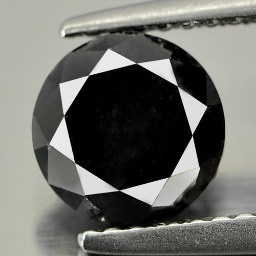Natural Black Loose Diamond 1.67 Ct. Round Brilliant Cut 6.9 Mm. From Belgium: Product ID: 802102168 Product Name: Natural Enhanced Diamond Weight: 1.67 CT. Size: 6.9 x 6.9 x 4.9 MM. Shape: Round Brilliant Cut Color: Black Clarity:Opaque Luster: Good Gems Origin: Belgium Treatme
