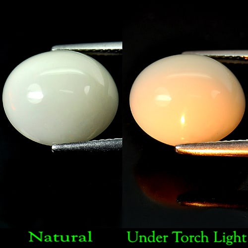 Natural White Opal 5.78 Ct. Oval Cabochon Shape 13.4 x 11.8 Mm. Gemstone From Ethiopia: Product ID: 818709332 Product Name: Natural Opal Weight: 5.78 CT. Size: 13.4 x 11.8 x 7.6 MM. Shape: Oval Cabochon Color: White Clarity:Semi - Transparent Luster: Good Gems Origin: Ethiopia Treatment: