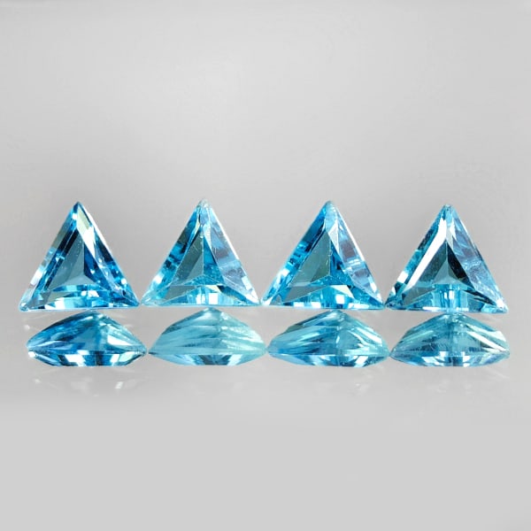 Natural Swiss Blue Topaz 2.04 Ct. 4 Pcs Trilliant Shape 5.5 x 5.5 Mm. Gemstones From Brazil: Product ID: 807167759 Product Name: Natural Blue Topaz Weight: 2.04 CT. Size: 5.5 x 5.5 x 2.8 MM. Shape: Trilliant Color: Blue Clarity:VVS Luster: Good Gems Origin: Brazil Treatment: Treated Crystal S