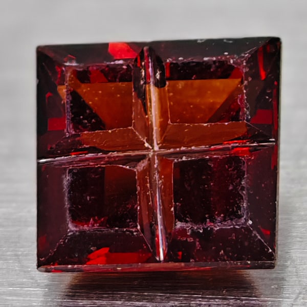 Natural Red Spessartine Garnet 0.98 Ct. Fancy Shape 5.3 Mm Gemstone from Madagascar: Product ID: 102900381 Product Name: Natural Spessartine Weight: 0.98 CT. Size: 5.3 x 5.3 x 3.3 MM. Shape: Fancy Color: Rich Red Clarity:VVS Luster: Good Gems Origin: Madagascar Treatment: Unheated Cry
