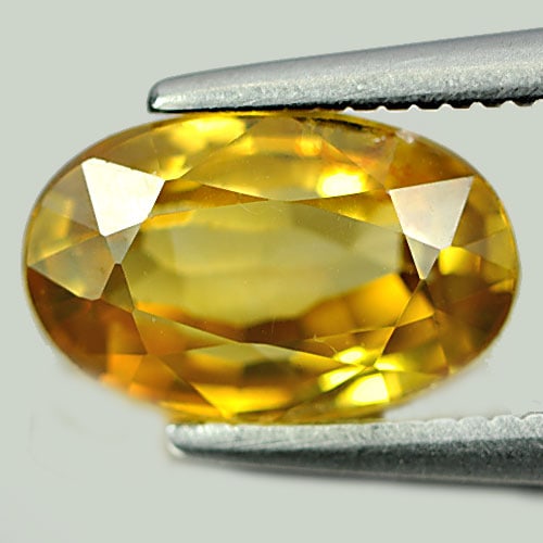 Natural Yellow Zircon 2.79 Ct. Oval Shape 9.4 x 6 Mm. Gemstone From Cambodia: Product ID: 807729419 Product Name: Natural Zircon Weight: 2.79 CT. Size: 9.4 x 6 x 4.2 MM. Shape: Oval Color: Yellow Clarity:VSI Luster: Very Good Gems Origin: Cambodia Treatment: Heated Crystal Stru