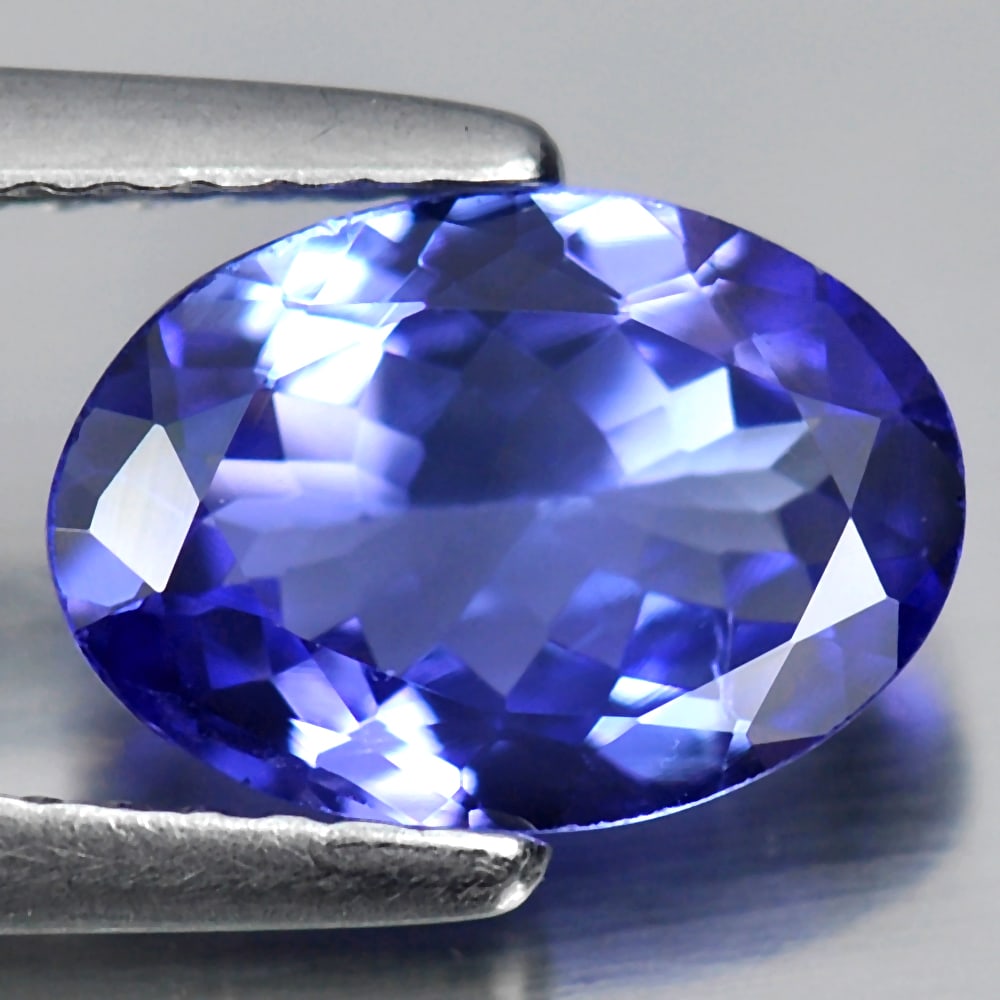 Natural Violetish Blue Tanzanite 1.48 Ct. Oval Shape 9.4 x 6.7 Mm. Gemstone From Tanzania: Product ID: 807009032 Product Name: Natural Tanzanite Weight: 1.48 CT. Size: 9.4 x 6.7 x 3.3 MM. Shape: Oval Color: Violetish Blue Clarity:VSI Luster: Very Good Gems Origin: Tanzania Treatment: Heated