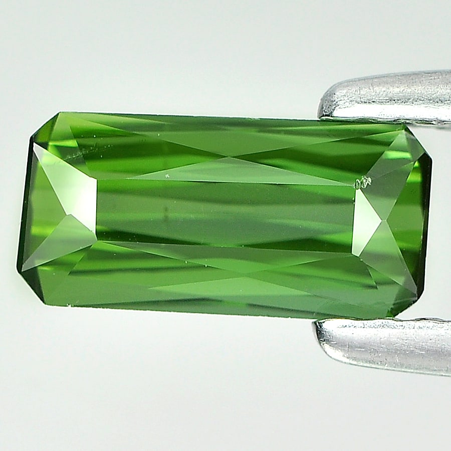 Natural Green Tourmaline 0.79 Ct. Octagon Shape 8.1 x 3.9 Mm Gemstone From Nigeria: Product ID: 807224302 Product Name: Natural Tourmaline Weight: 0.79 CT. Size: 8.1 x 3.9 x 2.9 MM. Shape: Octagon Color: Green Clarity:IF Luster: Good Gems Origin: Nigeria Treatment: Unheated Crystal S