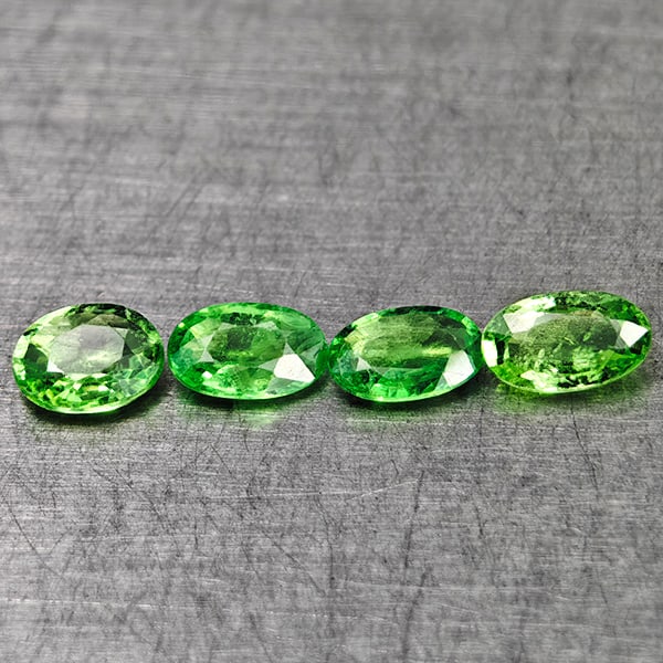 Natural Green Tsavorite Garnet 0.97 Ct. 4 Pcs Oval Shape 5.1 x 3.1 Mm Gemstones From Tanzania: Product ID: 803005006 Product Name: Natural Tsavorite Weight: 0.97 CT. Size: 5.1 x 3.1 x 2.1 MM. Shape: Oval Color: Green Clarity:VSI Luster: Very Good Gems Origin: Tanzania Treatment: Unheated Crysta