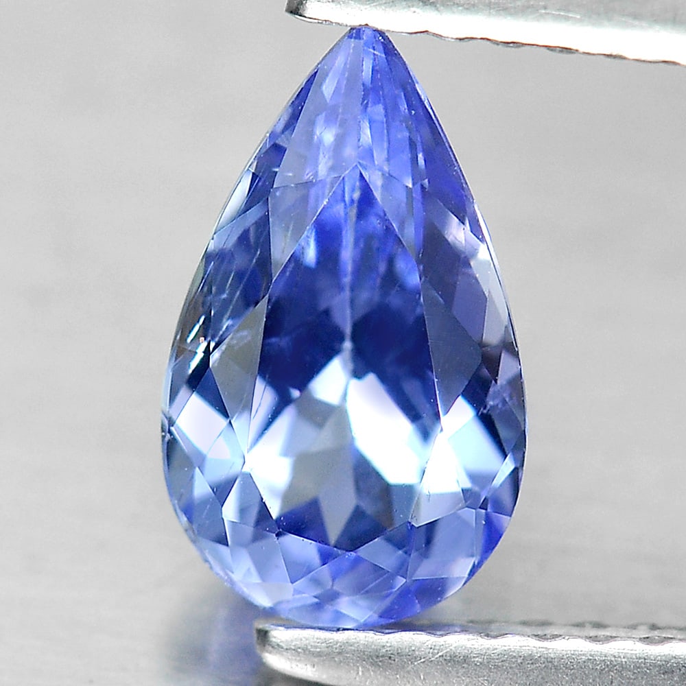 Certified Natural Violetish Blue Tanzanite 1.39 Ct. Pear Shape 9.54 x 5.73 Mm Gemstone from Tanzania: Product ID: 807003738 Product Name: Natural Tanzanite Weight: 1.39 CT. Size: 9.54 x 5.73 x 4.02 MM. Shape: Pear Color: Purple Clarity:VSI Luster: Very Good Gems Origin: Tanzania Treatment: Heated Crys