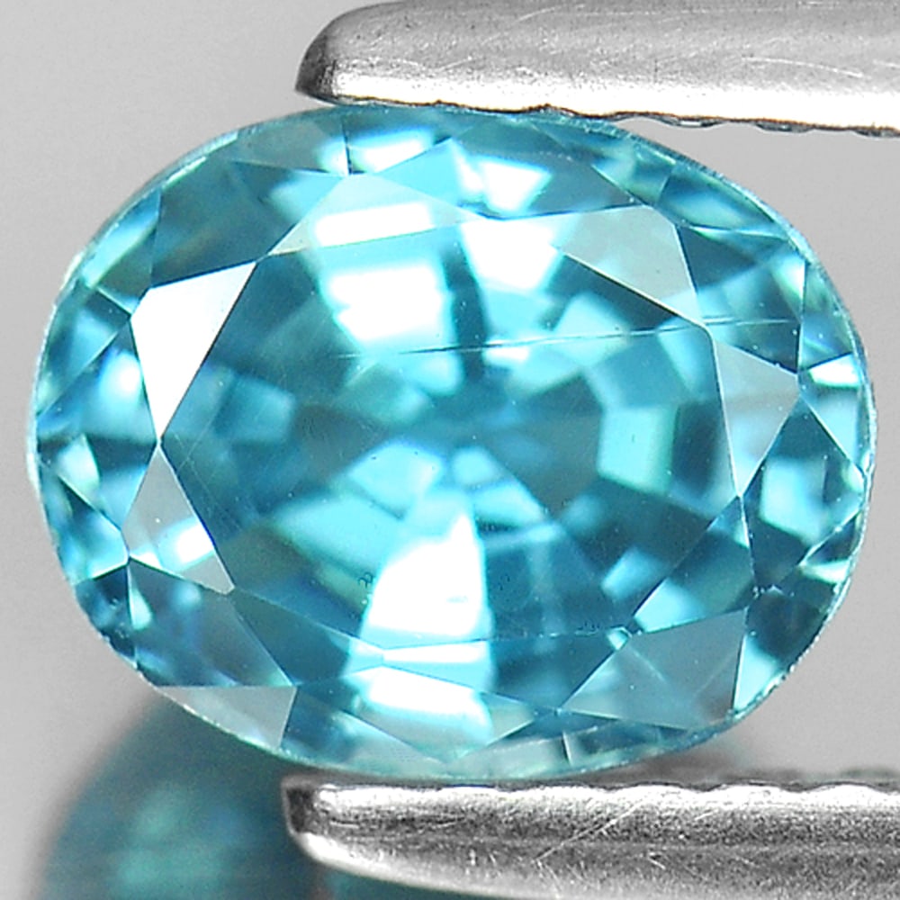 Natural Blue Zircon 2.33 Ct. Oval Shape 7.6 x 6.1 Mm. Gemstone From Cambodia: Product ID: 807730521 Product Name: Natural Zircon Weight: 2.33 CT. Size: 7.6 x 6.1 x 4.8 MM. Shape: Oval Color: Blue Clarity:VSI Luster: Very Good Gems Origin: Cambodia Treatment: Heated Crystal Stru