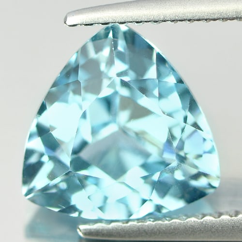 Natural Blue Topaz 4.24 Ct. Trilliant Shape 9.9 Mm Gemstone From Brazil: Product ID: 807165339 Product Name: Natural Blue Topaz Weight: 4.24 CT. Size: 9.9 x 9.9 x 6.3 MM. Shape: Trilliant Color: Blue Clarity:VVS Luster: Good Gems Origin: Brazil Treatment: Treated Crystal S