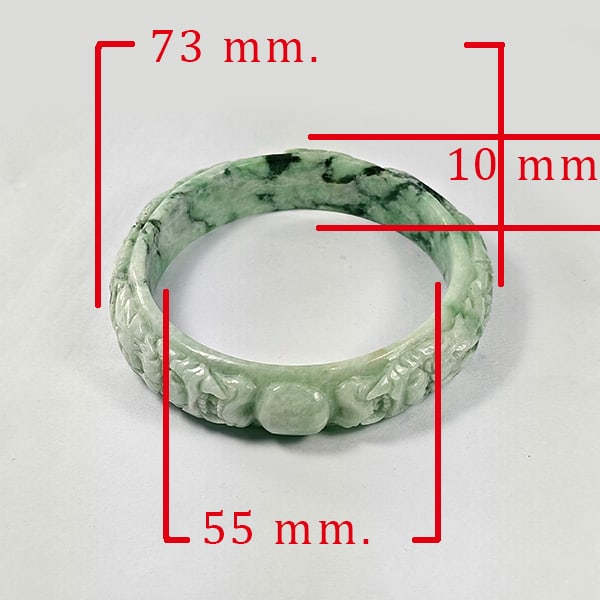 Natural Green Jade Bangle 275.00 Ct. Carving Diameter 55 Mm. Beautiful Design: Product ID: 818102683 Product Name: Natural Gemstones Weight: 275.00 CT. Size: 73 x 55 x 10 MM. Shape: Round Color: White Green Clarity:Opaque Luster: Good Gems Origin: Burma Treatment: Unheated Cryst