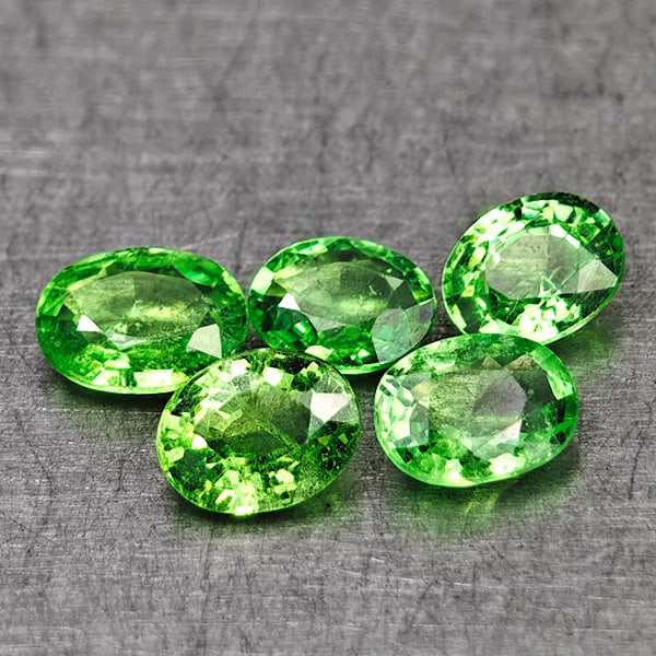 Natural Green Tsavorite Garnet 1.16 Ct. 5 Pcs Oval Shape 4.6 x 3.5 Mm Gemstones From Tanzania: Product ID: 803005007 Product Name: Natural Tsavorite Weight: 1.16 CT. Size: 4.6 x 3.5 x 1.7 MM. Shape: Oval Color: Green Clarity:VSI Luster: Very Good Gems Origin: Tanzania Treatment: Unheated Crysta