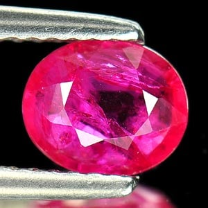 Unheated Natural Purplish Pink Ruby 0.98 Ct. Oval Shape 6.8 x 5.7 Mm. Gemstone From Tanzania (1 of 3)