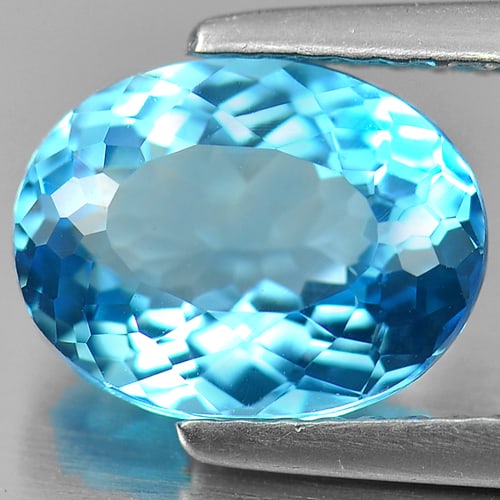 Natural Swiss Blue Topaz 2.76 Ct. Oval Shape 9.5 x 7.3 Mm Gemstone From Brazil: Product ID: 807155410 Product Name: Natural Blue Topaz Weight: 2.76 CT. Size: 9.5 x 7.3 x 5 MM. Shape: Oval Color: Swiss Blue Clarity:VVS Luster: Good Gems Origin: Brazil Treatment: Treated Crystal St