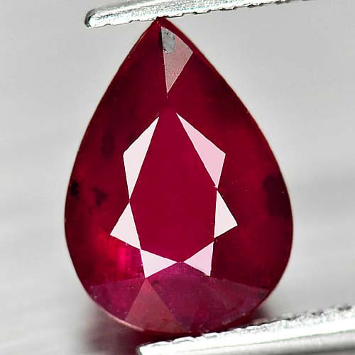 Natural Purplish Red Ruby 3.63 Ct. Pear Shape 10.2 x 7.2 Mm Gemstone From Madacascar: Product ID: 805931151 Product Name: Natural Ruby Weight: 3.63 CT. Size: 10.2 x 7.2 x 6.2 MM. Shape: Pear Color: Purplish Red Clarity:SI1 Luster: Good Gems Origin: Mardagascar Treatment: Heated (Lead-g