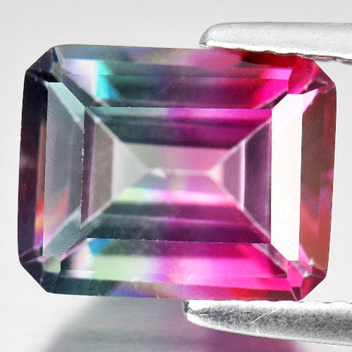 Natural Emerald Envy Pure Pink Topaz 4.28 Ct. Octagon Shape 10.1 x 8.1 Mm. Gemstone from Brazil: Product ID: 807166505 Product Name: Natural Topaz Weight: 4.28 CT. Size: 10.1 x 8.1 x 5.7 MM. Shape: Octagon Color: Bi-Color Clarity:VVS Luster: Good Gems Origin: Brazil Treatment: Treated Crystal Str