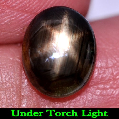 Natural Black Star Sapphire 6 Rays 2.98 Ct. Oval Cabochon Shape 9.5 x 7.6 Mm. Gemstone From: Product ID: 806155133 Product Name: Natural Star Sapphire Weight: 2.98 CT. Size: 9.5 x 7.6 x 3.5 MM. Shape: Oval Cabochon Color: Black Clarity:Opaque Luster: Good 6 Rays Star Gems Origin: Thailand Tre