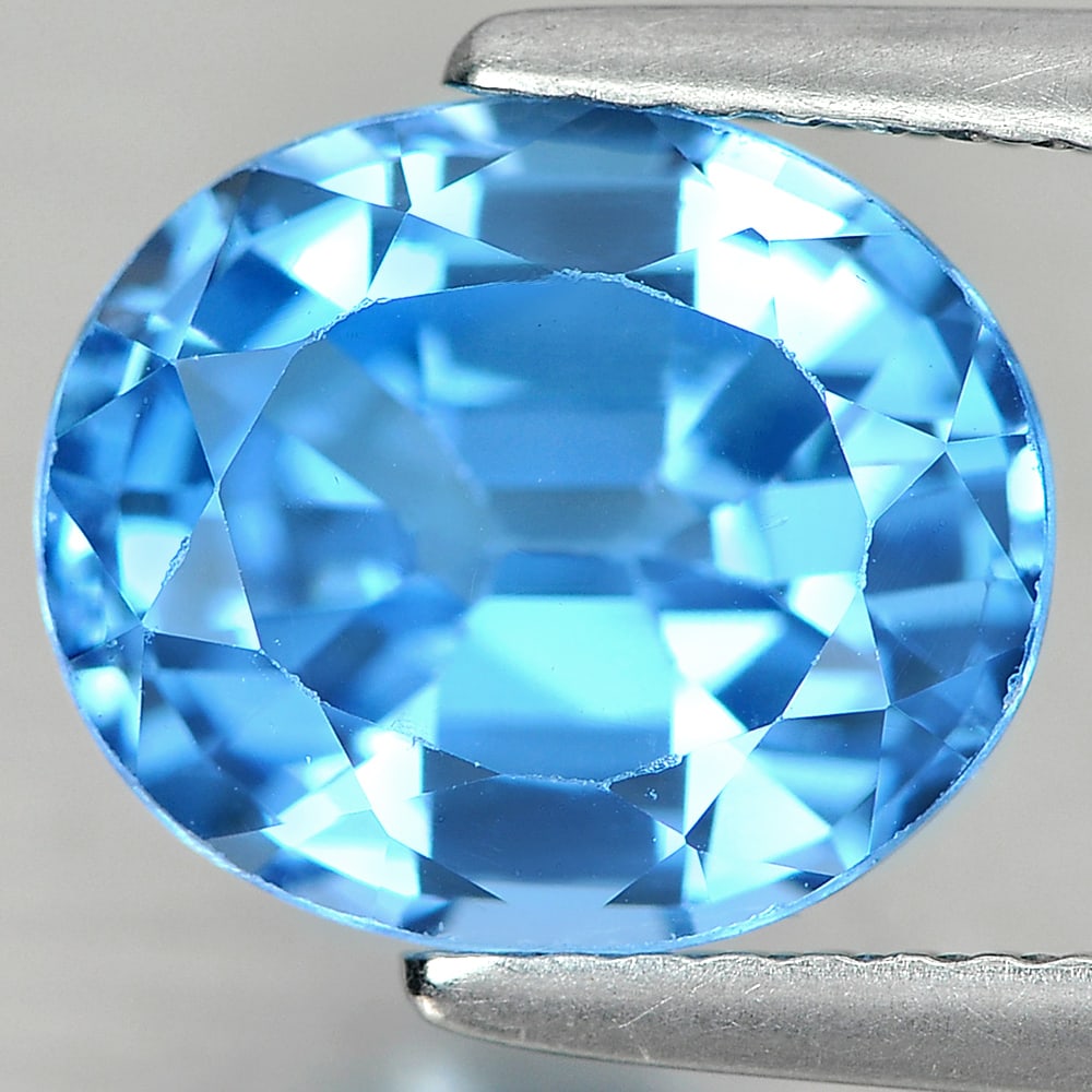 Natural Swiss Blue Topaz 4.28 Ct. Oval Shape 10.2 x 8.6 Mm Gemstone From Brazil: Product ID: 807167326 Product Name: Natural Blue Topaz Weight: 4.28 CT. Size: 10.2 x 8.6 x 6 MM. Shape: Oval Color: Blue Clarity:SI Luster: Good Gems Origin: Brazil Treatment: Treated Crystal Structur