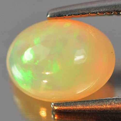 Multi Color Play Of Colour Natural Opal 0.74 Ct. Oval Cabochon Shape 8 x 6.2 Mm Gemstone From (1 of 3)
