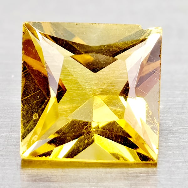 Natural Yellow Citrine 1.37 Ct Square Princess Cut 7 Mm Gemstone From Brazil: Product ID: 801815027 Product Name: Natural Citrine Weight: 1.37 CT. Size: 7 x 7 x 4.4 MM. Shape: Square Princess Cut Color: Yellow Clarity:IF Luster: Good Gems Origin: Brazil Treatment: Unheated Crys