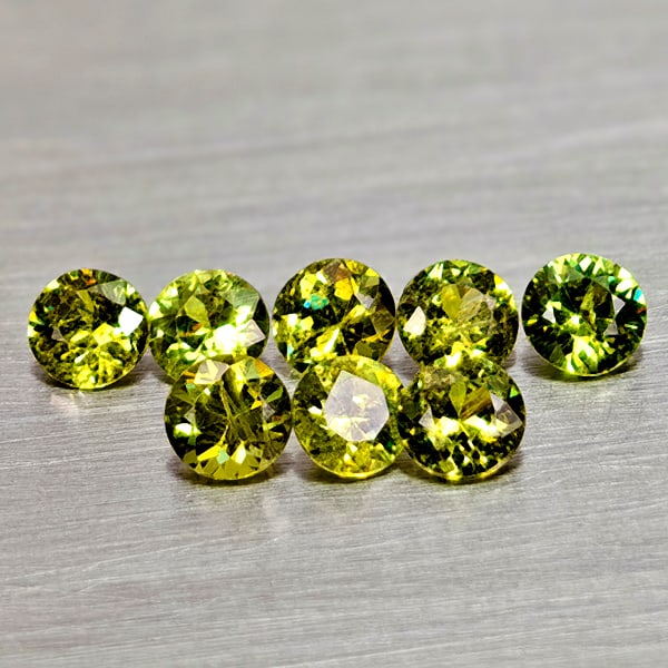 Natural Yellowish Green Demantoid Garnet 0.97 Ct. 8 Pcs Round Diamond Cut 3 Mm Gemstones From: Product ID: 802936569 Product Name: Natural Demantoid Weight: 0.97 CT. Size: 3 x 3 x 2.9 MM. Shape: Round Diamond Cut Color: Yellowish Green Clarity:VSI Luster: Good Gems Origin: Madagascar Treatment: